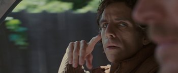 Movie still from “Greenberg” (2010), directed by Noah Baumbach – A person holding his hand up to his face; Close Up shot, Low angle