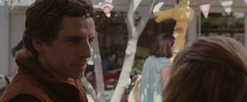 Movie still from “Greenberg” (2010), directed by Noah Baumbach – A man's face in front of trees; Close Up shot, Over the shoulder angle