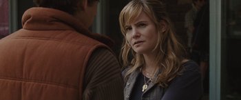 Movie still from “Greenberg” (2010), directed by Noah Baumbach – A young woman is standing next to a young man; Close Up shot, Over the shoulder angle