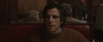Movie still from “Greenberg” (2010), directed by Noah Baumbach – Ben stiller sitting in a chair; Close Up shot, Over the shoulder angle