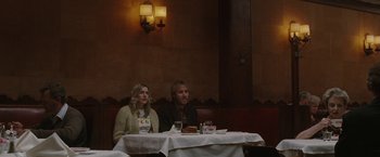 Movie still from “Greenberg” (2010), directed by Noah Baumbach – A man and a woman sitting at a table; Medium shot, Over the shoulder angle