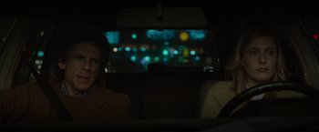 Movie still from “Greenberg” (2010), directed by Noah Baumbach – Two people sitting in the back of a car at night; Medium shot, Over the shoulder angle