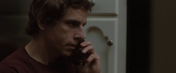 Movie still from “Greenberg” (2010), directed by Noah Baumbach – A person talking on a cell phone; Close Up shot, Over the shoulder angle