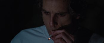 Movie still from “Greenberg” (2010), directed by Noah Baumbach – A person lighting a cigarette; Close Up shot, High angle