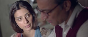 Movie still from “Haider” (2014), directed by Vishal Bhardwaj – A man and a woman looking at one another; Close Up shot, Over the shoulder angle