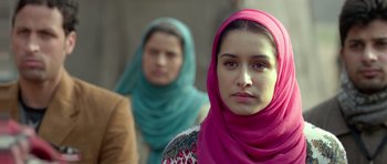 Movie still from “Haider” (2014), directed by Vishal Bhardwaj – Two women wearing head scarfs standing next to each other; Close Up shot, Low angle