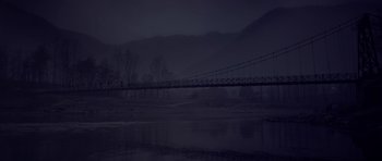 Movie still from “Haider” (2014), directed by Vishal Bhardwaj – A bridge over a body of water at night time; Extreme Wide shot, High angle