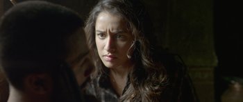 Movie still from “Haider” (2014), directed by Vishal Bhardwaj – A person with long curly hair; Close Up shot, Over the shoulder angle