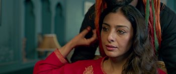 Movie still from “Haider” (2014), directed by Vishal Bhardwaj – A person wearing a red shirt; Close Up shot, Over the shoulder angle