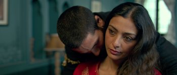 Movie still from “Haider” (2014), directed by Vishal Bhardwaj – A man and a woman are hugging each other; Close Up shot, Over the shoulder angle