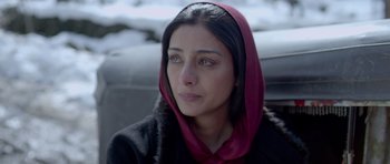 Movie still from “Haider” (2014), directed by Vishal Bhardwaj – A person wearing a hood; Close Up shot, High angle