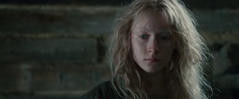 Movie still from “Hanna” (2011), directed by Joe Wright – A woman with long blonde hair and blue eyes; Close Up shot, Over the shoulder angle