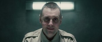 Movie still from “Hanna” (2011), directed by Joe Wright – A person wearing a shirt and tie; Close Up shot, Low angle