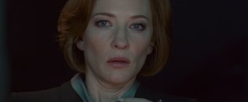 Movie still from “Hanna” (2011), directed by Joe Wright – A person with short red hair; Close Up shot, Over the shoulder angle