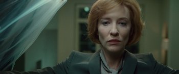 Movie still from “Hanna” (2011), directed by Joe Wright – A person holding an umbrella; Close Up shot, Low angle