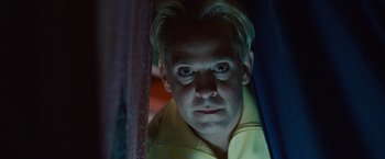 Movie still from “Hanna” (2011), directed by Joe Wright – A person looking at the camera; Close Up shot, Low angle