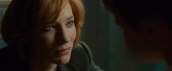 Movie still from “Hanna” (2011), directed by Joe Wright – A person looking at the camera; Close Up shot, Over the shoulder angle