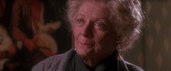 Movie still from “Hook” (1991), directed by Steven Spielberg – An old woman with a sad look on her face; Close Up shot, Low angle