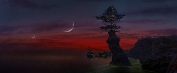 Movie still from “Hook” (1991), directed by Steven Spielberg – A boat is sailing on the water near a tree; Extreme Wide shot, Low angle