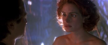 Movie still from “Hook” (1991), directed by Steven Spielberg – A person wearing a white dress; Close Up shot, Over the shoulder angle