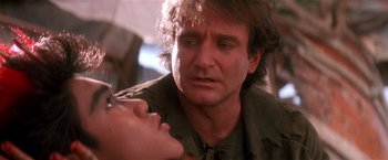 Movie still from “Hook” (1991), directed by Steven Spielberg – A man and a woman looking at one another; Close Up shot, Over the shoulder angle