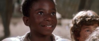 Movie still from “Hook” (1991), directed by Steven Spielberg – A young boy's face; Close Up shot, Low angle