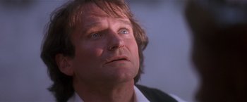 Movie still from “Hook” (1991), directed by Steven Spielberg – A person looking up at the sky; Close Up shot, Low angle