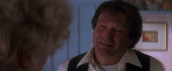 Movie still from “Hook” (1991), directed by Steven Spielberg – Robin williams in a scene from the movie good will hunting; Close Up shot, Over the shoulder angle