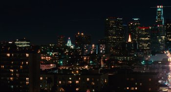 Movie still from “Hot Tub Time Machine” (2010), directed by Steve Pink – A view of a city skyline at night with lights on; Extreme Wide shot, High angle