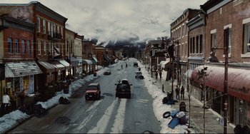 Movie still from “Hot Tub Time Machine” (2010), directed by Steve Pink – Cars driving down a street in the snow; Extreme Wide shot, High angle