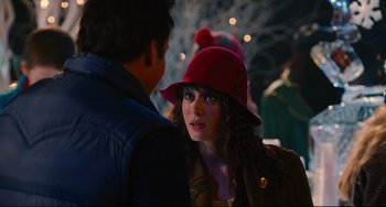 Movie still from “Hot Tub Time Machine” (2010), directed by Steve Pink – A woman wearing a red hat talking to a man; Close Up shot, Over the shoulder angle
