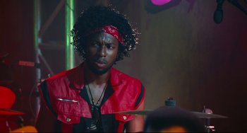 Movie still from “Hot Tub Time Machine” (2010), directed by Steve Pink – A man in a red jacket and a red bandanna; Close Up shot, Over the shoulder angle