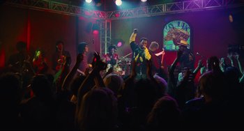 Movie still from “Hot Tub Time Machine” (2010), directed by Steve Pink – A crowd of people are gathered around a band; Extreme Wide shot, Low angle