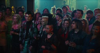 Movie still from “Hot Tub Time Machine” (2010), directed by Steve Pink – A group of people standing in front of a wall; Wide shot, High angle