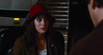 Movie still from “Hot Tub Time Machine” (2010), directed by Steve Pink – A person wearing a red hat; Close Up shot, Over the shoulder angle