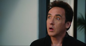 Movie still from “Hot Tub Time Machine” (2010), directed by Steve Pink – A person looking up at something; Close Up shot, Over the shoulder angle