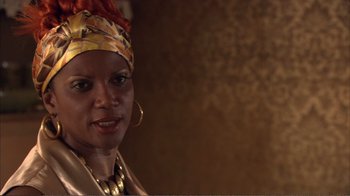 Movie still from “How High” (2001), directed by Jesse Dylan – A person wearing a turban; Close Up shot, Over the shoulder angle