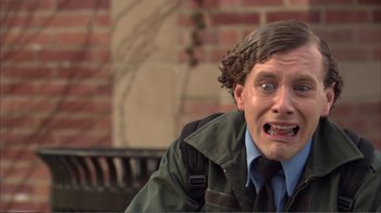 Movie still from “How High” (2001), directed by Jesse Dylan – A man in a green jacket is making a funny face; Close Up shot, High angle