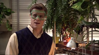 Movie still from “How High” (2001), directed by Jesse Dylan – A young man wearing green goggles in a room; Medium shot, Low angle