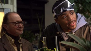 Movie still from “How High” (2001), directed by Jesse Dylan – A man wearing goggles sitting next to another man; Close Up shot, Over the shoulder angle