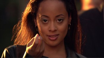 Movie still from “How High” (2001), directed by Jesse Dylan – A person with long hair; Close Up shot, High angle