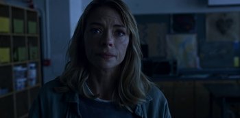 Movie still from “Black Summer” (2019), created by John Hyams – A person wearing a shirt; Close Up shot, Low angle