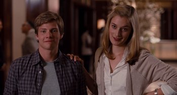 Movie still from “It's Complicated” (2009), directed by Nancy Meyers – A man and a woman standing next to each other; Medium shot, Over the shoulder angle