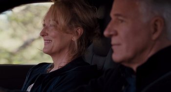 Movie still from “It's Complicated” (2009), directed by Nancy Meyers – A woman and a man sitting in the back of a car; Close Up shot, Over the shoulder angle