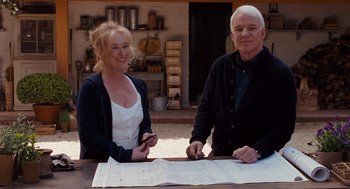 Movie still from “It's Complicated” (2009), directed by Nancy Meyers – A man and a woman sitting at a table; Medium shot, Over the shoulder angle