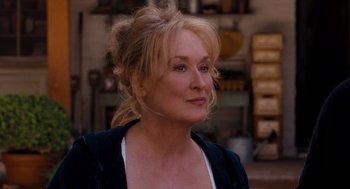 Movie still from “It's Complicated” (2009), directed by Nancy Meyers – A person wearing a jacket; Close Up shot, Over the shoulder angle
