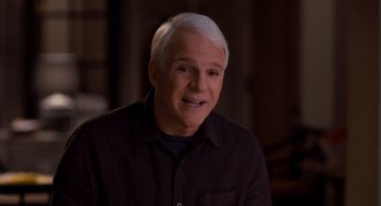 Movie still from “It's Complicated” (2009), directed by Nancy Meyers – A person wearing a black shirt; Medium shot, Over the shoulder angle