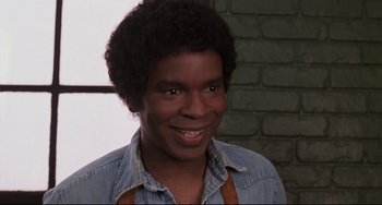 Movie still from “Jumanji” (1995), directed by Joe Johnston – A person wearing an apron; Close Up shot, Low angle