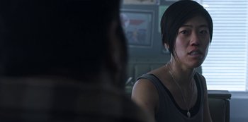 Movie still from “Black Summer” (2019), created by John Hyams – A woman is sitting in front of another woman; Close Up shot, Over the shoulder angle