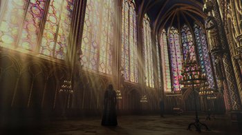 Movie still from “Knightfall” (2017), created by Richard Rayner – A woman in a long black dress standing in front of stained glass windows; Extreme Wide shot, Low angle